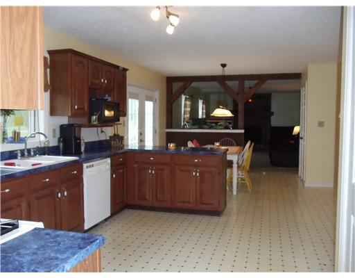 118 Smith Road Sarver, PA 16055 - Photo 3 of 10 Kitchen. OPEN-FLOOR PLAN, SPACIOUS KITCHEN WITH ISLAND SEPARATING BREAKFAST DINING AREA WITH HALF-WALL DIVIDER INTO FAMIILY ROOM
