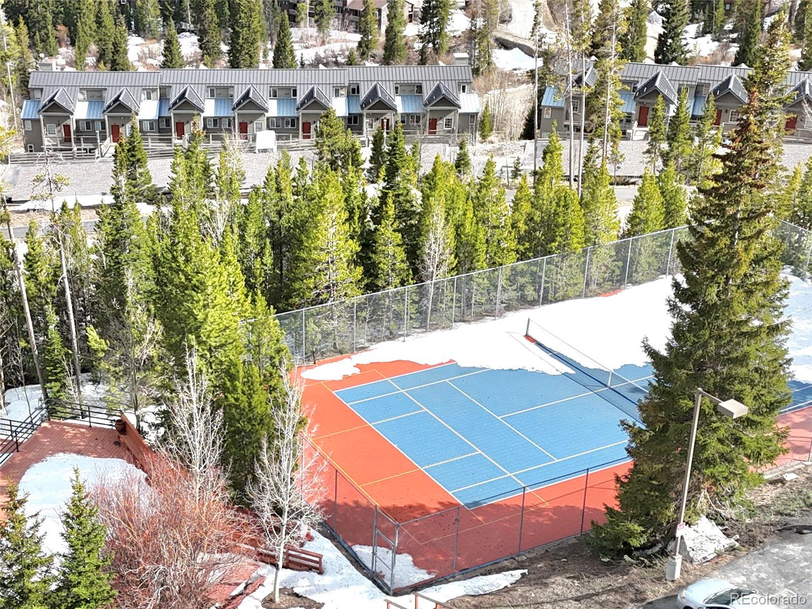 91300 Ryan Gulch Road, Unit 91305 Silverthorne, CO 80498 - Photo 39 of 40 a view of swimming pool with a yard