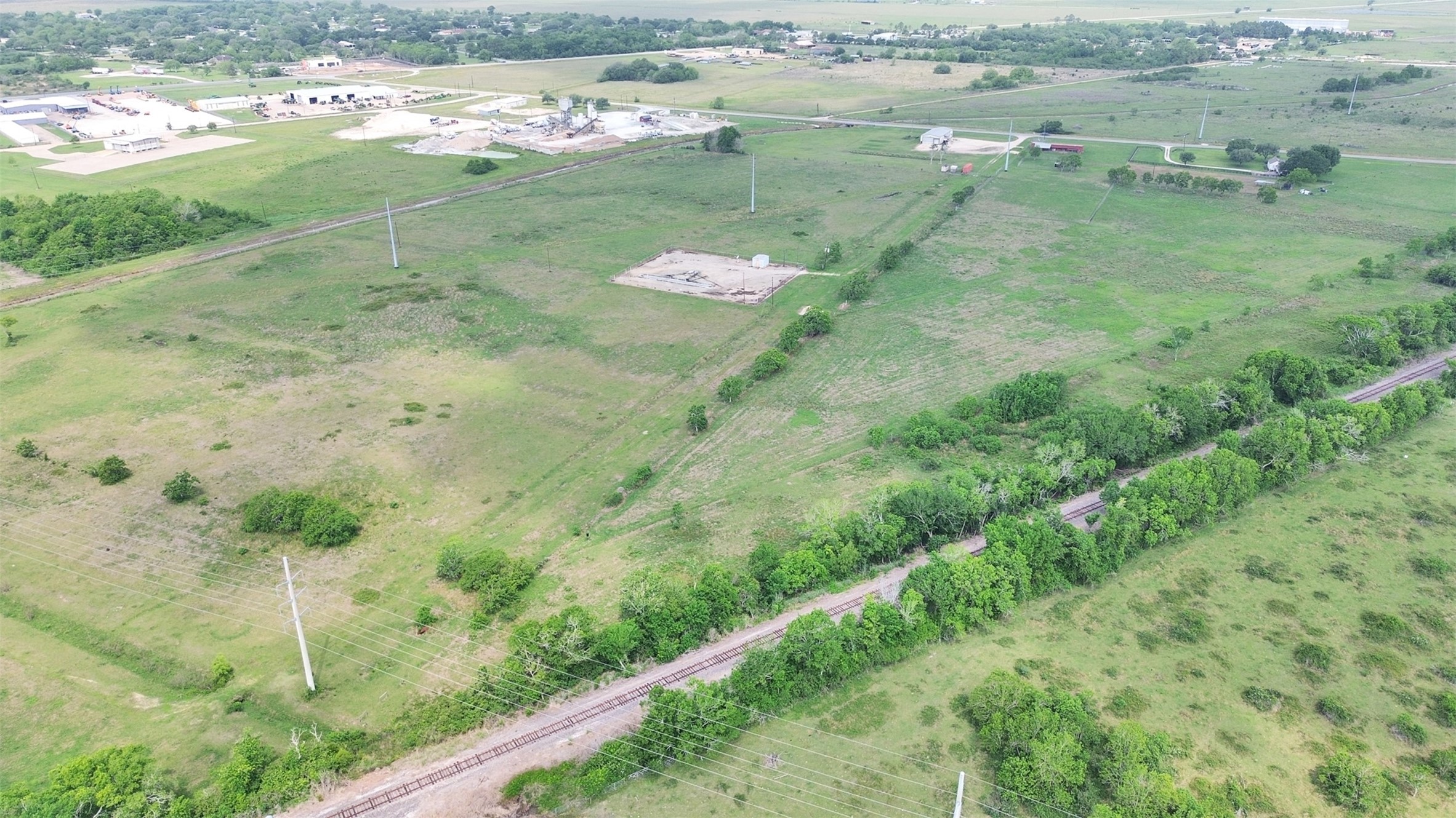 2100 Pine Knoll Road Bay City, TX 77414 - Photo 14 of 28 a view of a water pond with green field