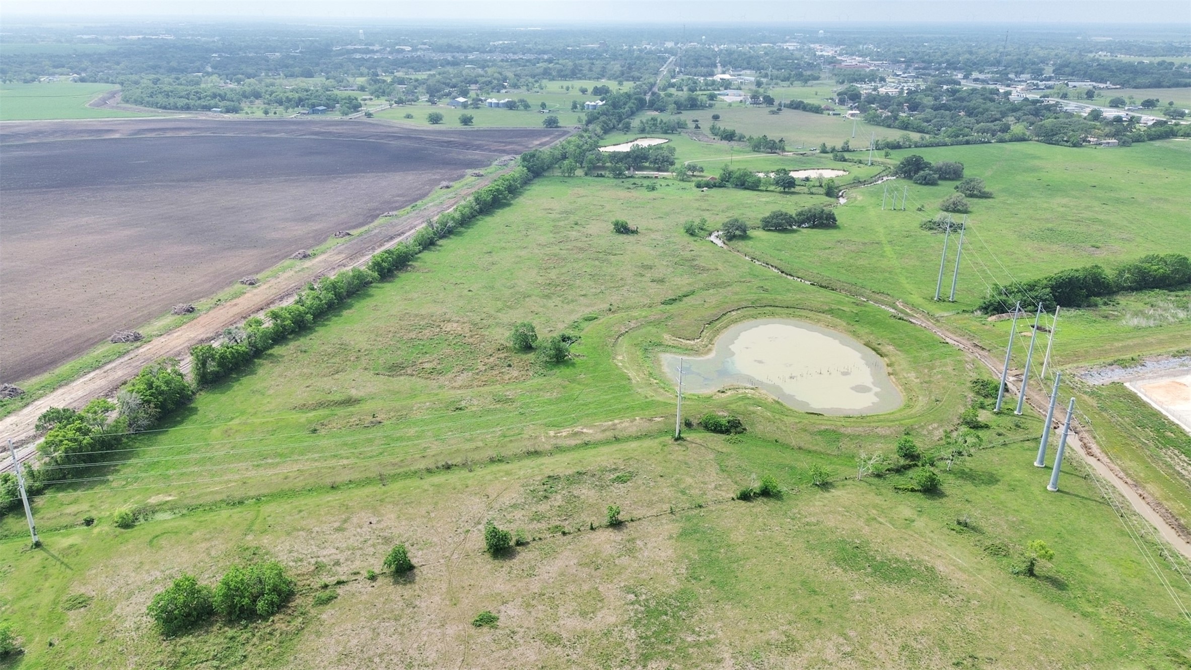 2100 Pine Knoll Road Bay City, TX 77414 - Photo 15 of 28 an aerial view of a houses with a yard and lake view