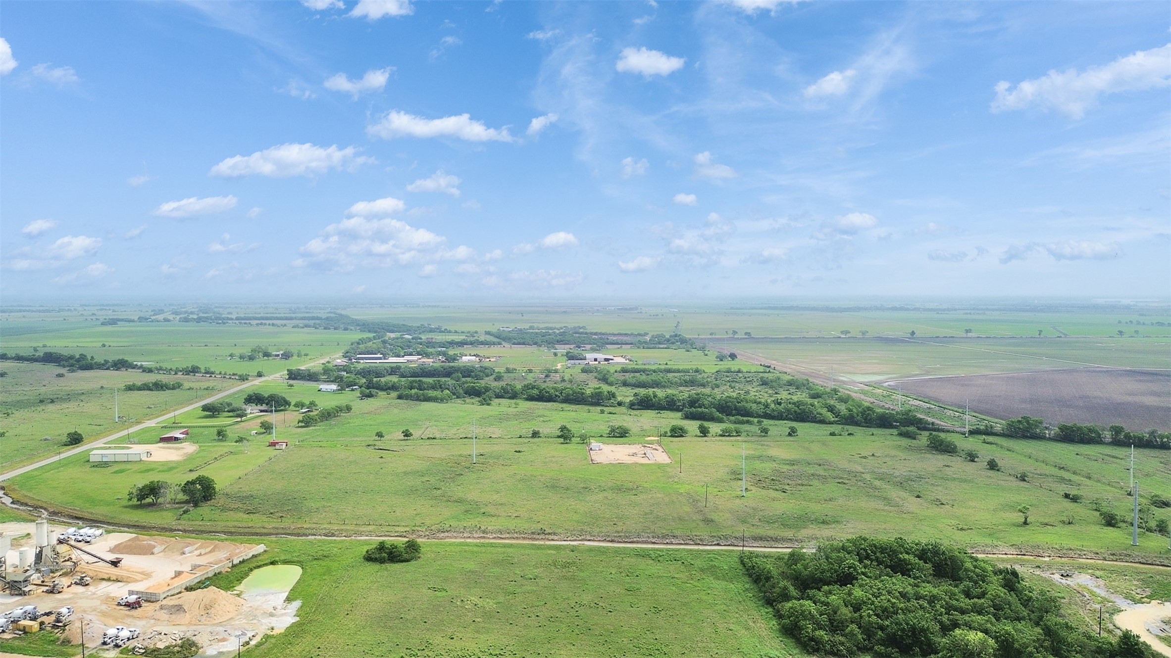2100 Pine Knoll Road Bay City, TX 77414 - Photo 17 of 28 a view of a lake with a yard