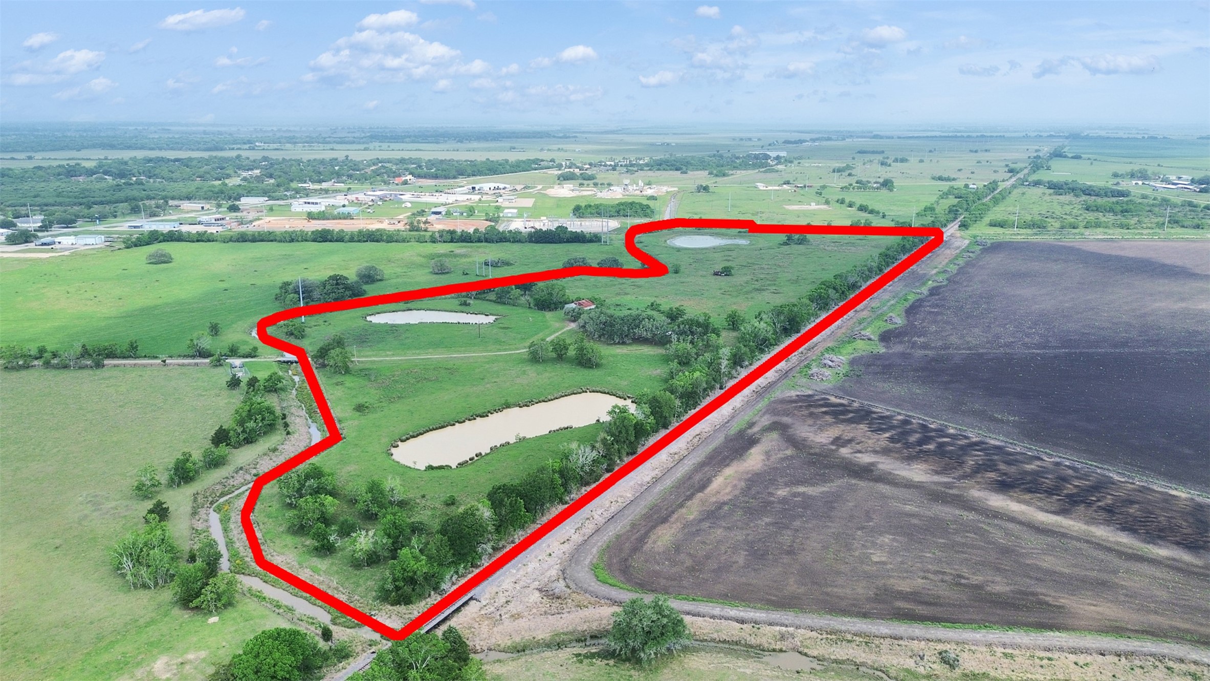 2100 Pine Knoll Road Bay City, TX 77414 - Photo 5 of 28 a view of a tennis ground with a swimming pool