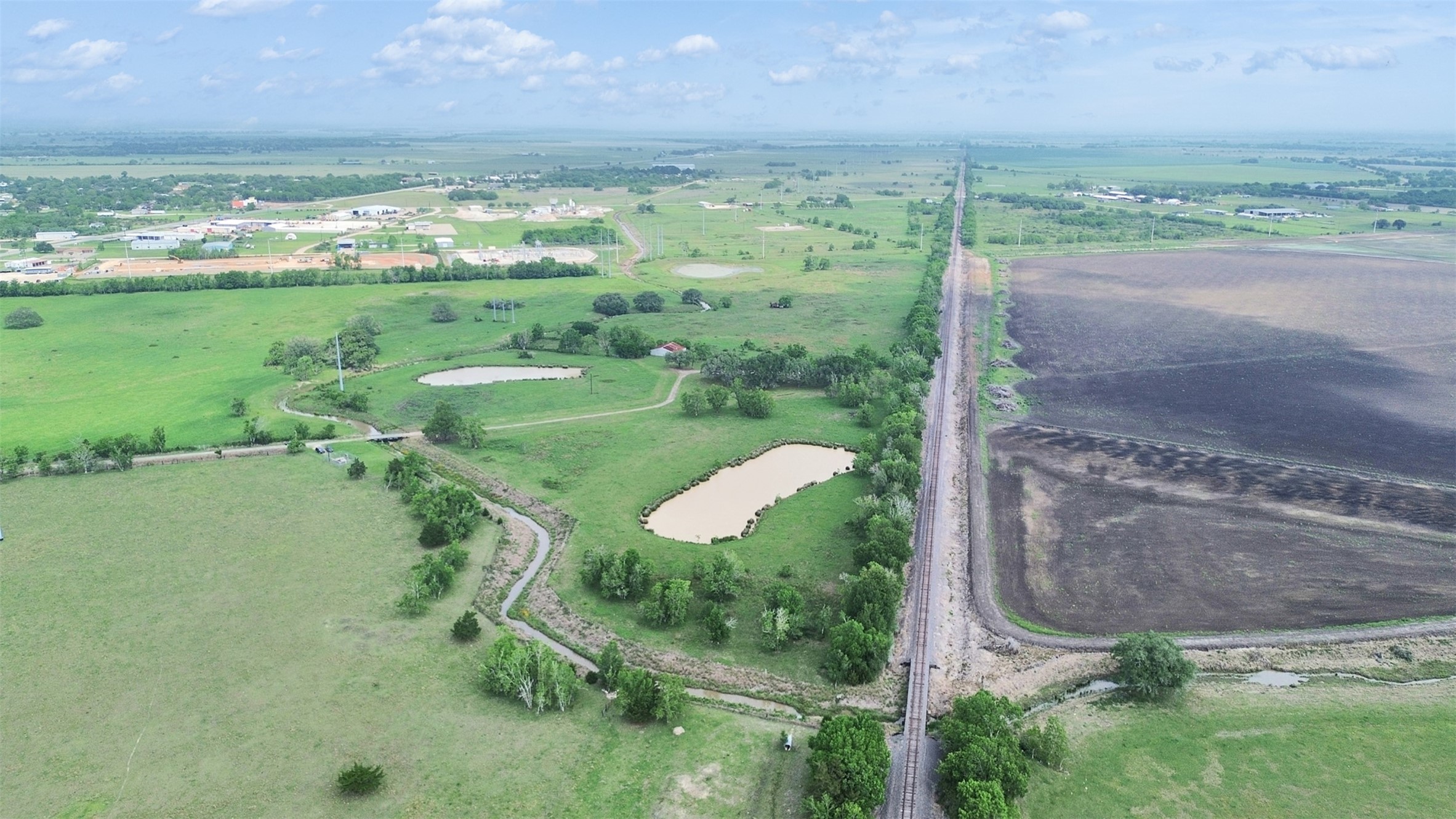 2100 Pine Knoll Road Bay City, TX 77414 - Photo 10 of 28 a view of a water fountain and a big yard