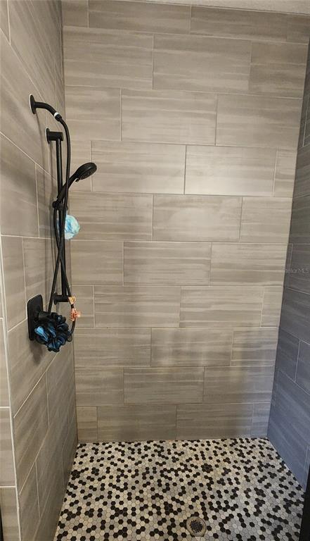 9032 Cape Cod Road DeLand, FL 32724 - Photo 11 of 16 a bathroom with a shower