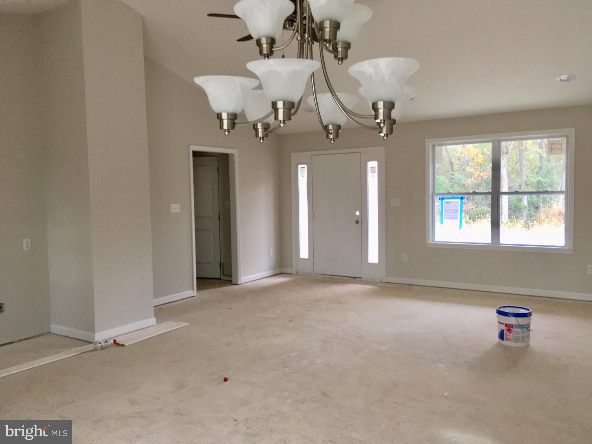 16 Dimension Road Inwood, WV 25428 - Photo 5 of 16 Living Room & view to front door