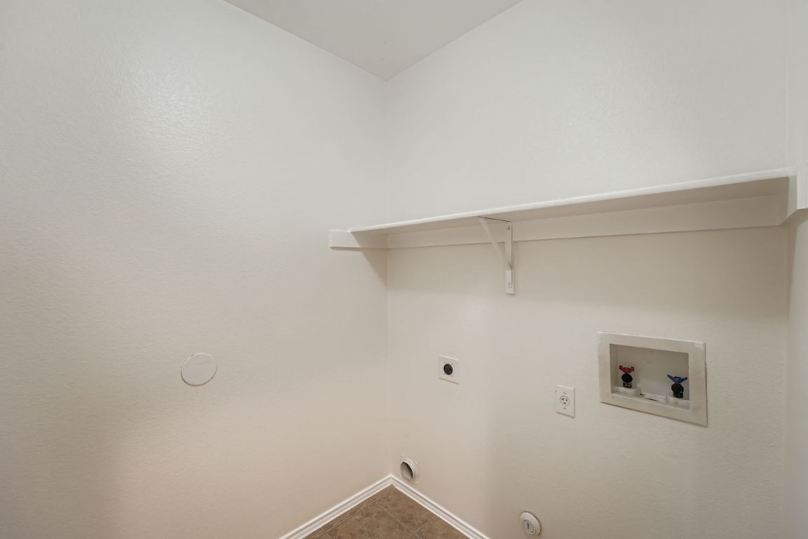 12612 Waynespur Lane Elgin, TX 78621 - Photo 18 of 22 a view of an empty room