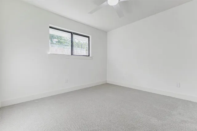 a bathroom with double sink and a mirror
