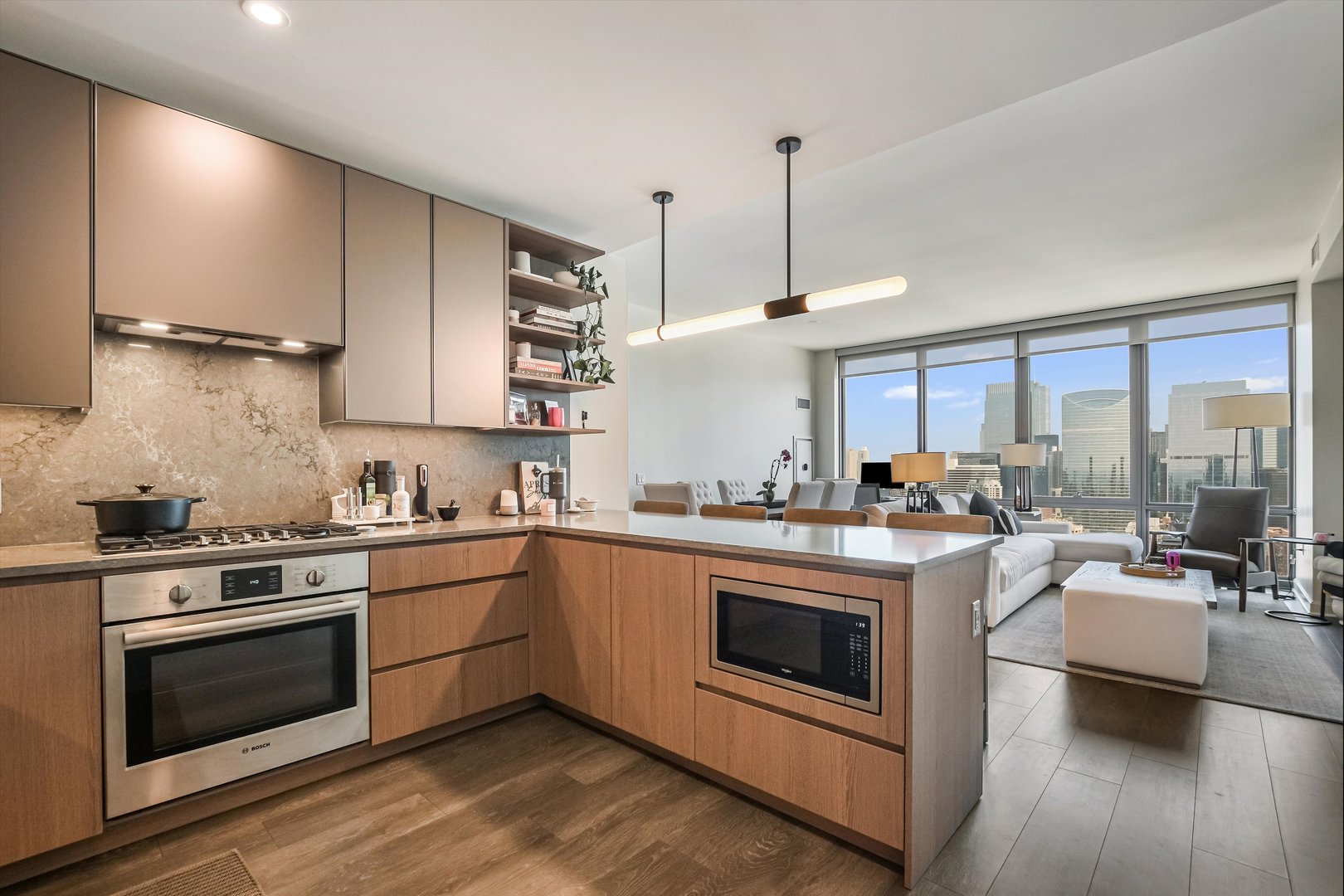 164 North Peoria Street, Unit 4004 Chicago, IL 60607 - Photo 11 of 32 a kitchen with a stove oven and sink