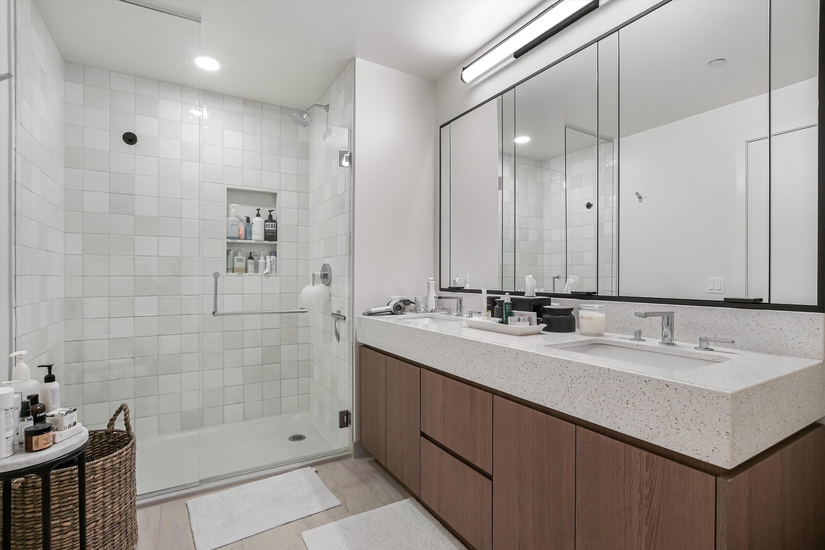 164 North Peoria Street, Unit 4004 Chicago, IL 60607 - Photo 16 of 32 a bathroom with double sink and a mirror