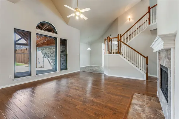 a view of an entryway with wooden floor
