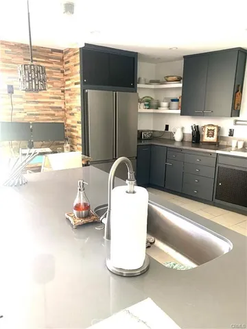a kitchen with a stove and cabinets