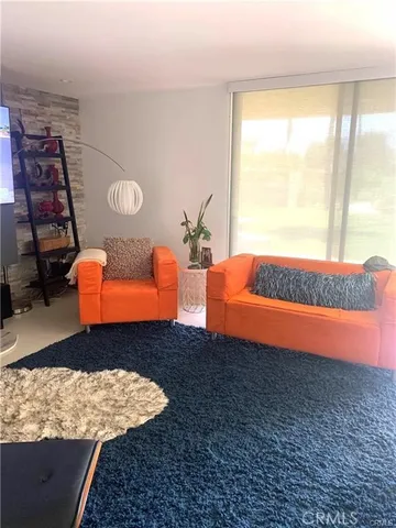a kitchen with a sink and a refrigerator