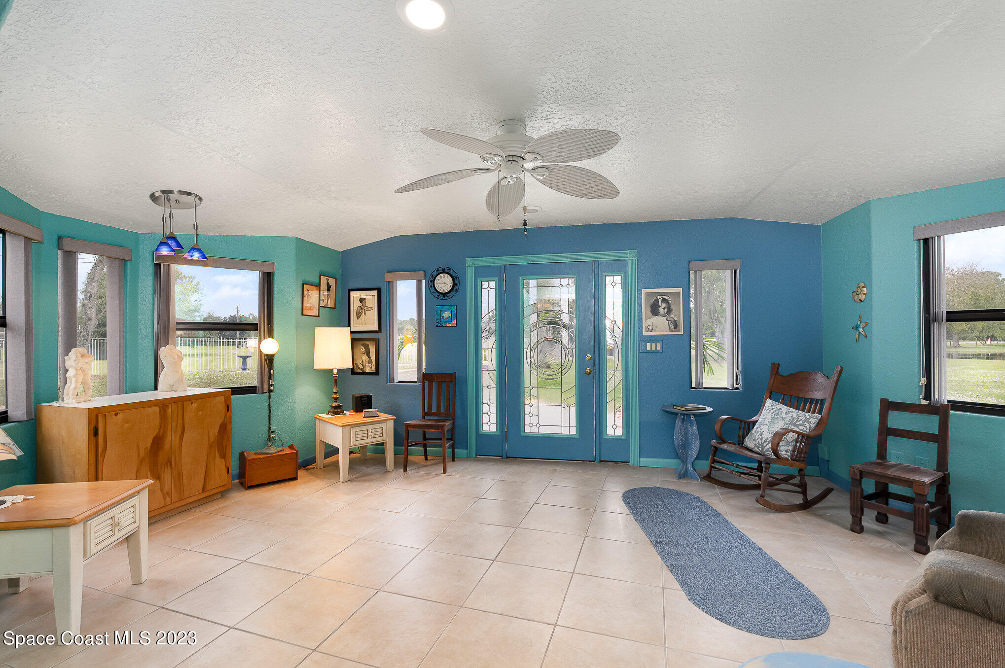 2025 Cox Road Cocoa, FL 32926 - Photo 11 of 49 a living room with furniture and a large window