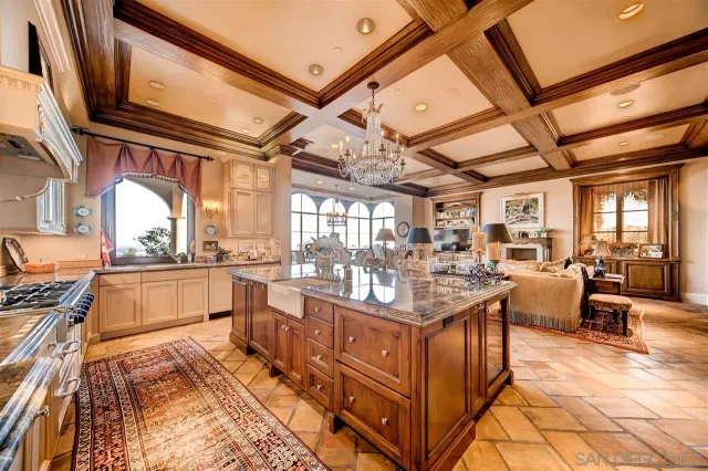 a dining room with furniture and a window