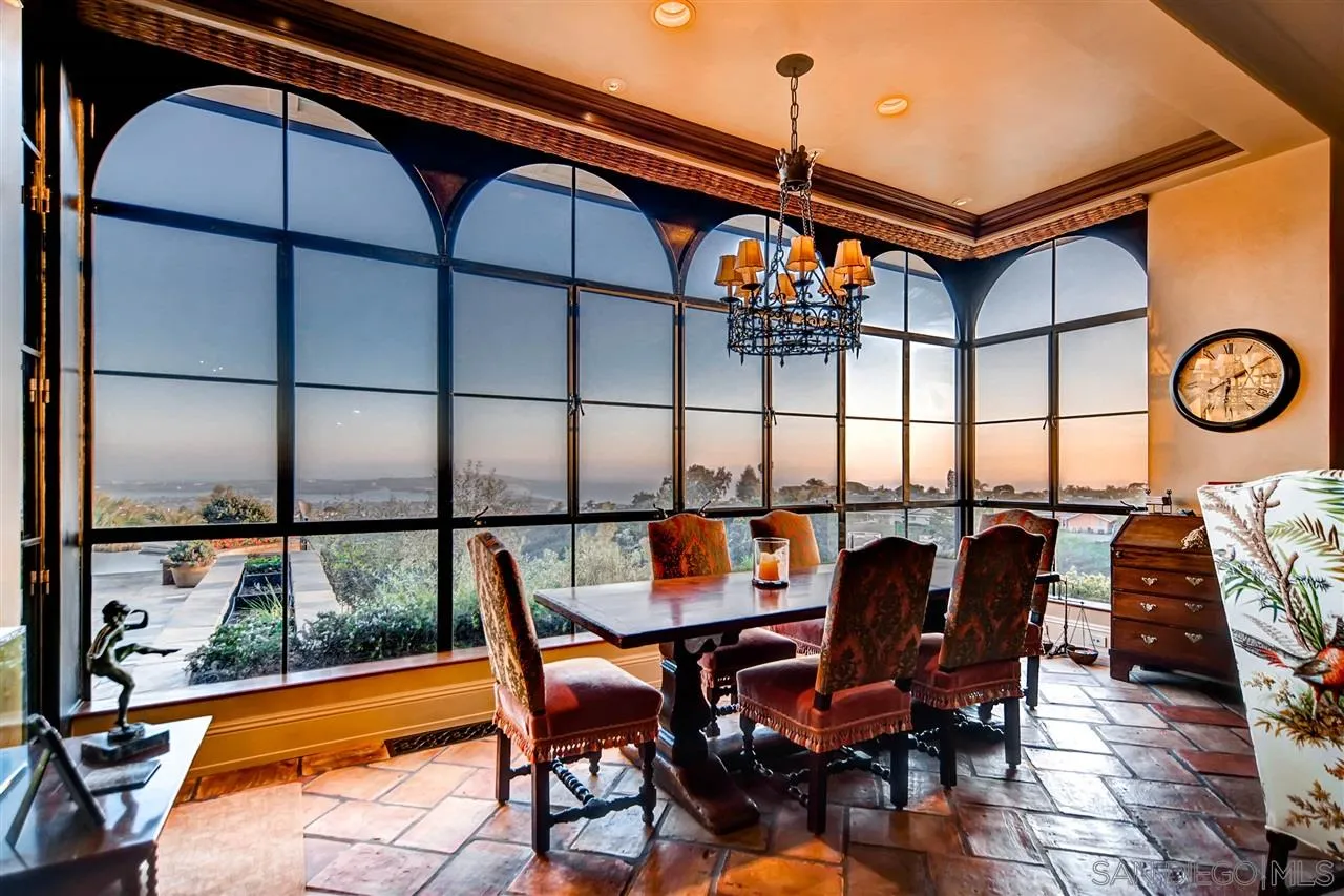 5806 Bucknell Avenue La Jolla, CA 92037 - Photo 14 of 25 a dining room with furniture and a window