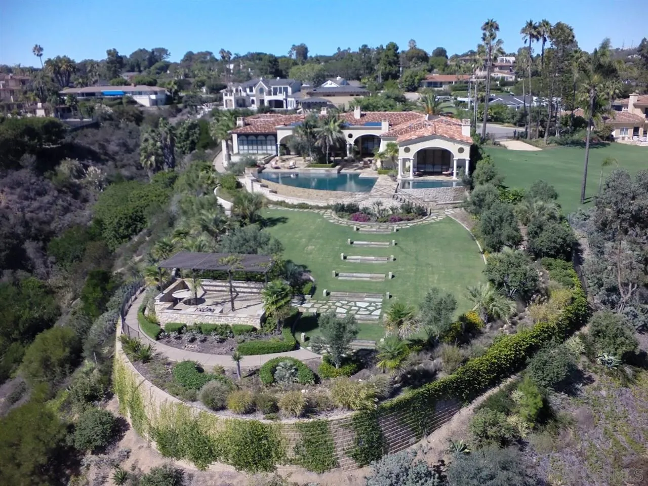 5806 Bucknell Avenue La Jolla, CA 92037 - Photo 22 of 25 an aerial view of a house with a yard and lake view