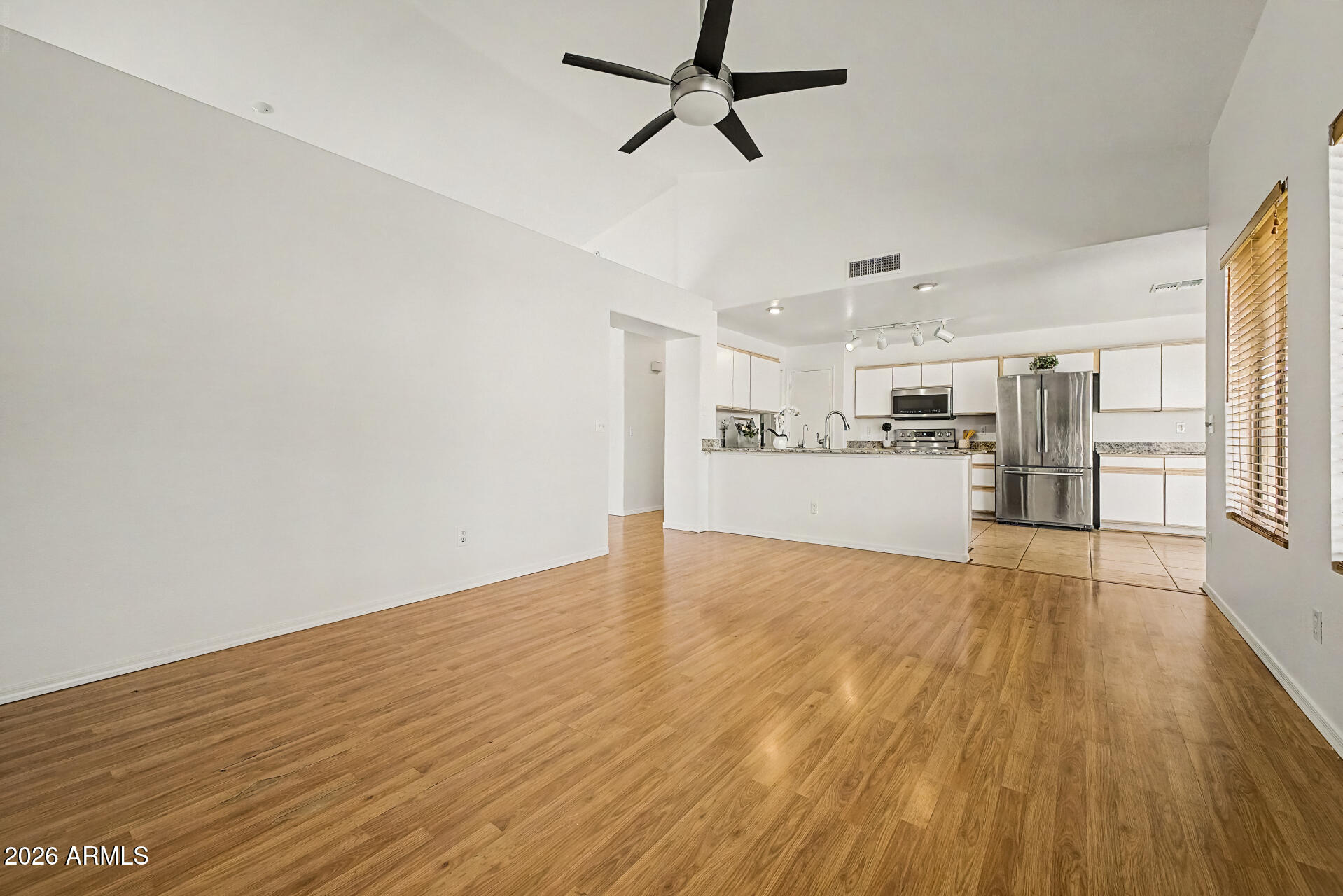 2762 North Ricardo Mesa, AZ 85215 - Photo 14 of 38 a view of a kitchen with a wooden floor
