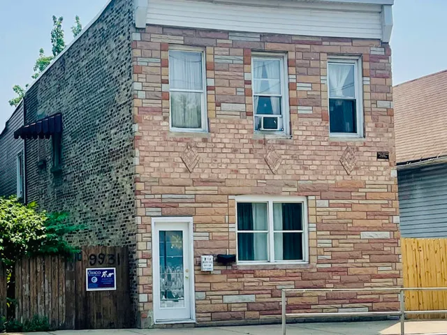 a kitchen with granite countertop a stove sink and cabinets