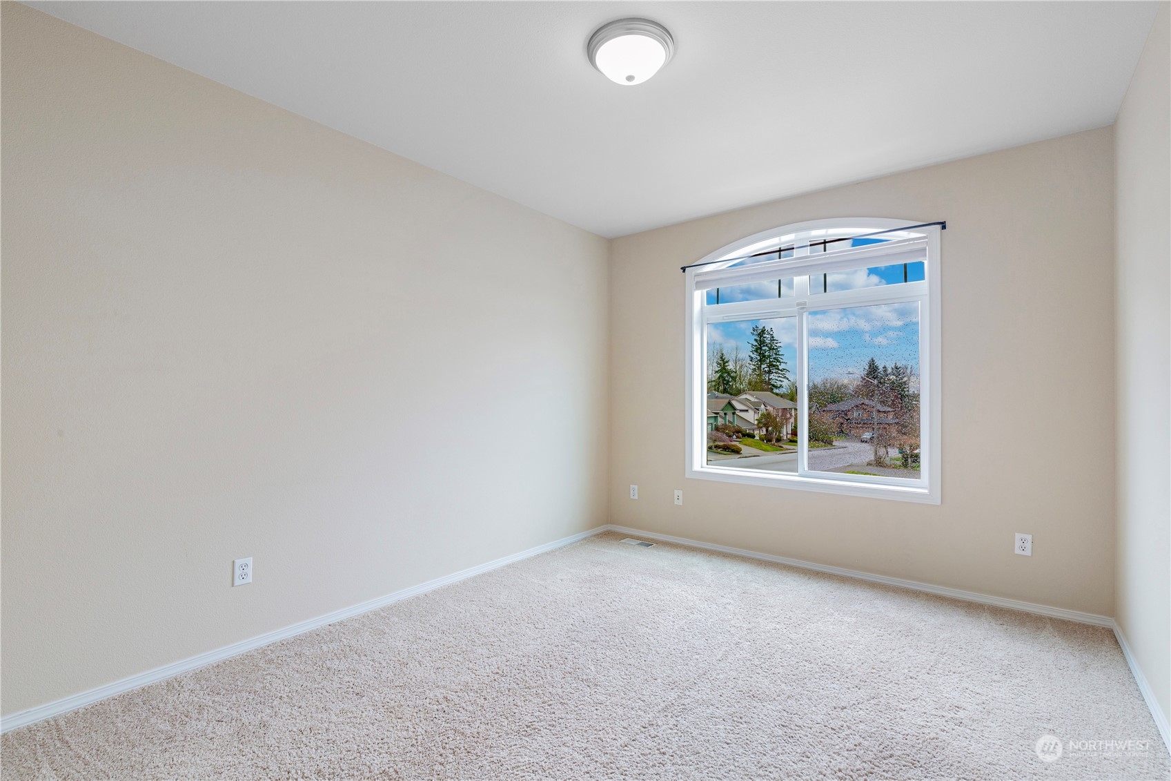 5954 Northeast 3rd Court Renton, WA 98059 - Photo 20 of 34 an empty room with windows