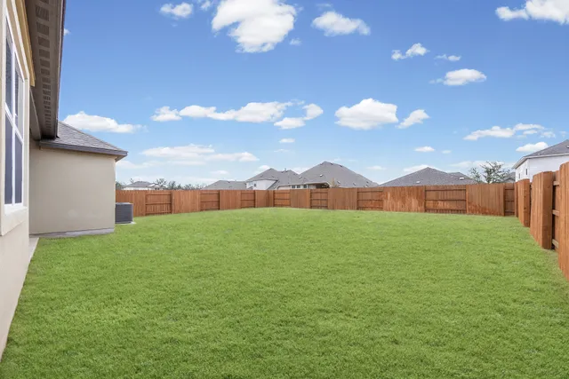 a view of outdoor space with swimming pool and seating