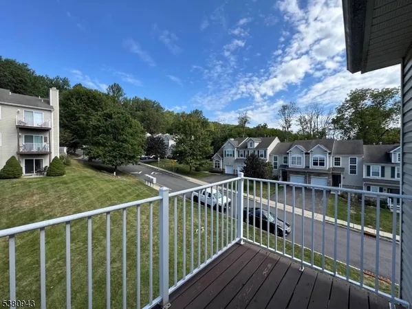a view of balcony with furniture