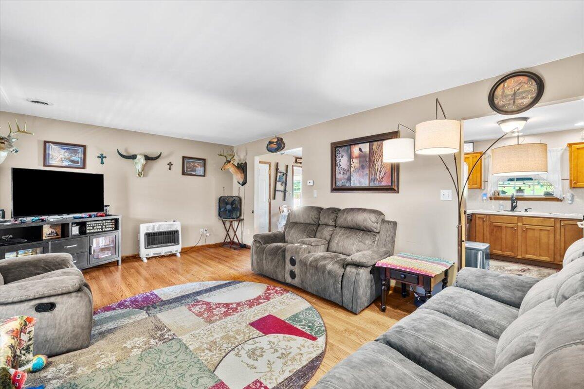 623 Kunkletown Road Kunkletown, PA 18058 - Photo 17 of 37 a living room with furniture a flat screen tv and a table