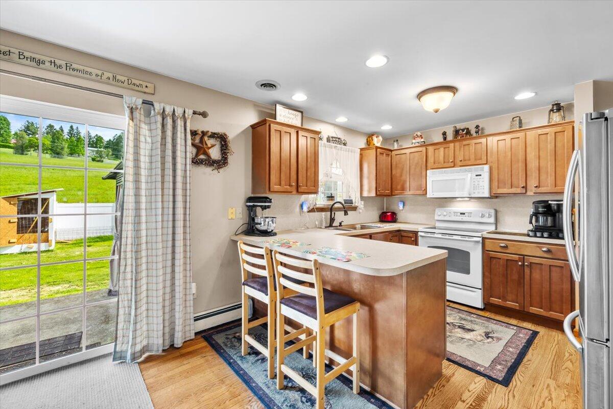623 Kunkletown Road Kunkletown, PA 18058 - Photo 21 of 37 a kitchen with a sink appliances cabinets and furniture
