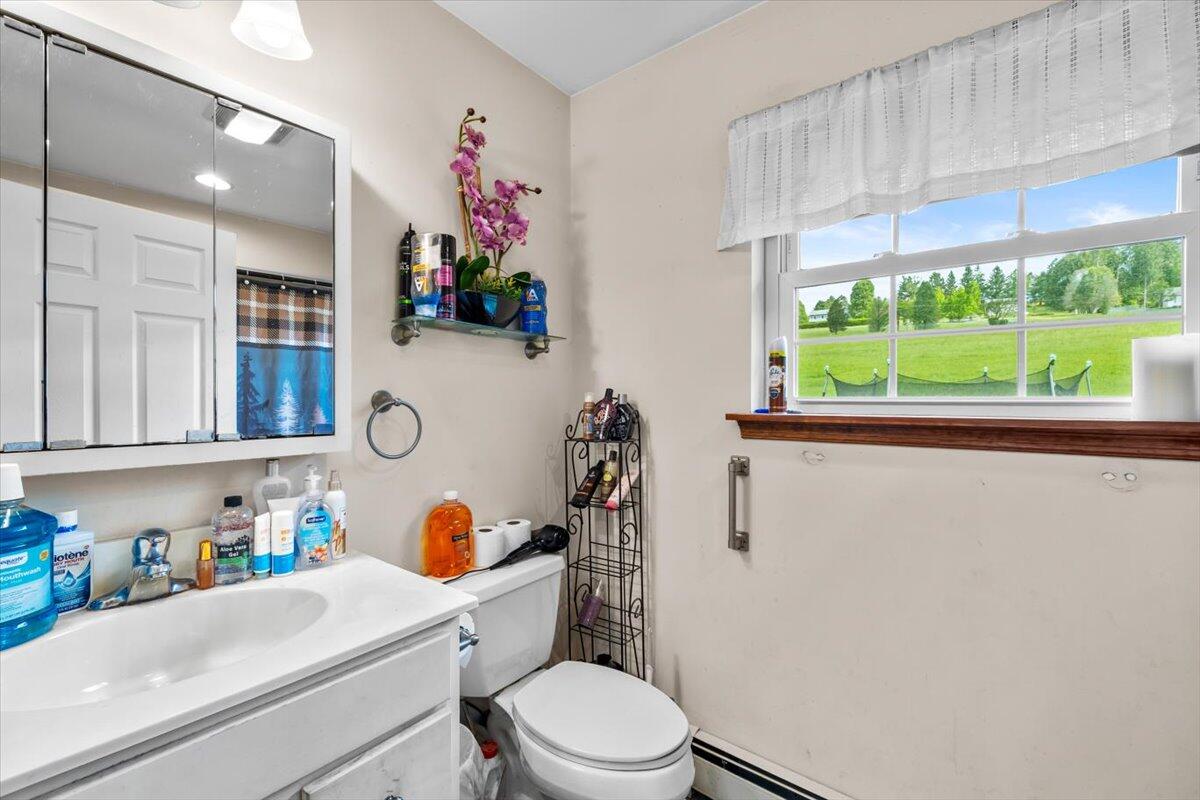 623 Kunkletown Road Kunkletown, PA 18058 - Photo 31 of 37 a bathroom with a sink a toilet and a large window