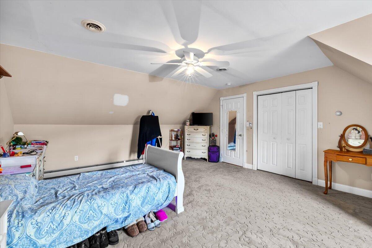 623 Kunkletown Road Kunkletown, PA 18058 - Photo 33 of 37 a bed room with a bed and a chandelier