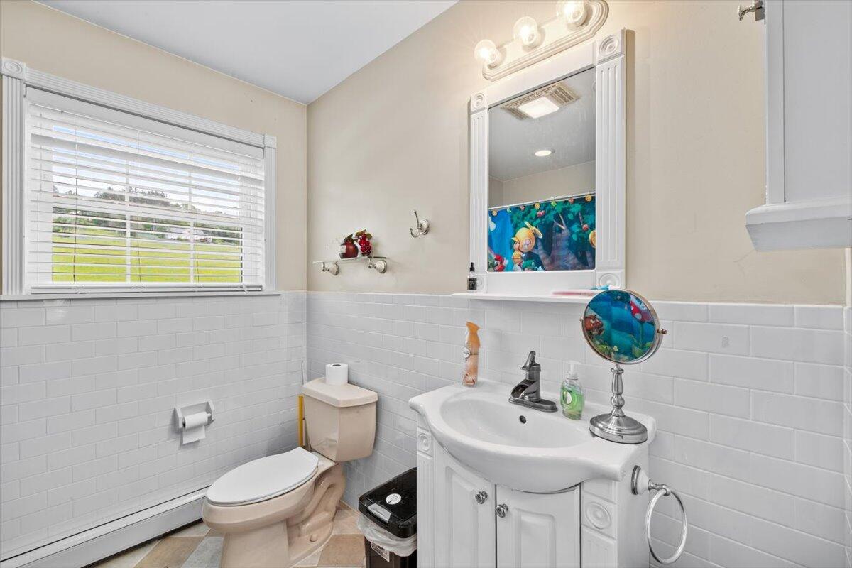623 Kunkletown Road Kunkletown, PA 18058 - Photo 34 of 37 a bathroom with a sink and a mirror
