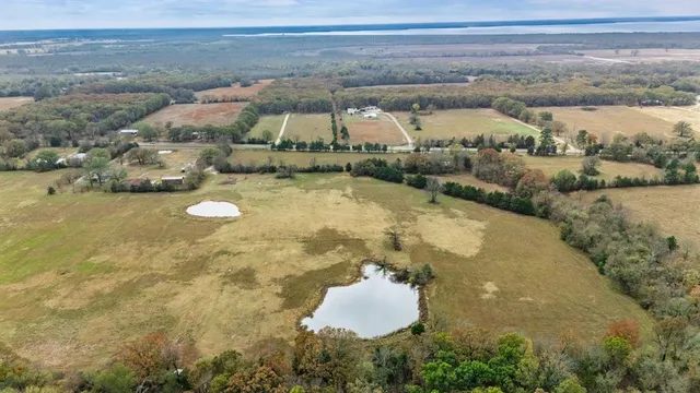 a aerial view of a house with outdoor space