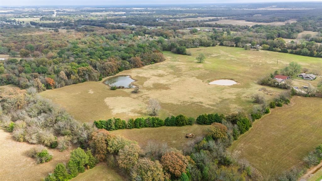 154 St Cooper Tx 75432 Cooper, TX 75432 - Photo 14 of 33 a view of a field with an ocean view