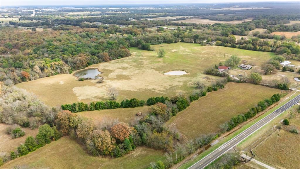 154 St Cooper Tx 75432 Cooper, TX 75432 - Photo 15 of 33 a view of a lake with a city