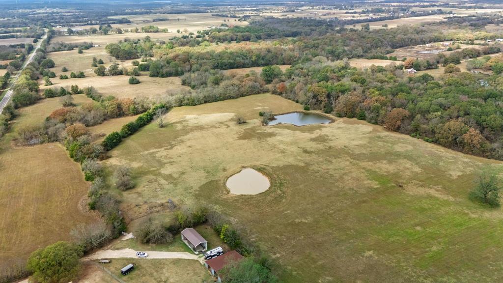 154 St Cooper Tx 75432 Cooper, TX 75432 - Photo 22 of 33 a bathroom with a sink and a toilet