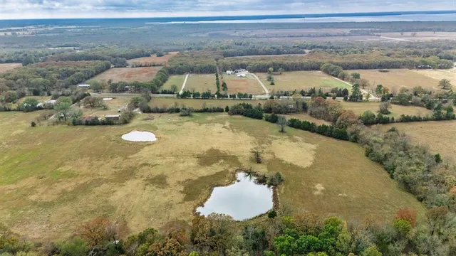 a aerial view of a house with outdoor space