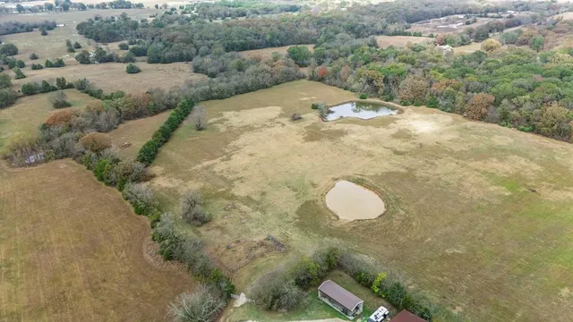 a view of a backyard of a house