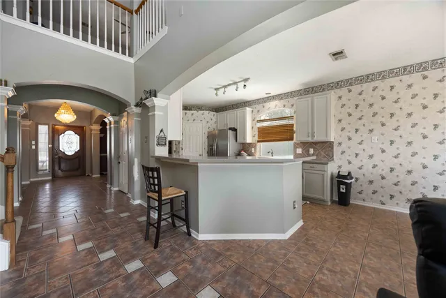 a view of a living room and dining room