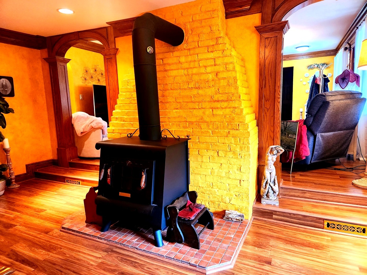 1095 South Prospect Avenue Elmhurst, IL 60126 - Photo 12 of 54 a living room with a fireplace furniture and a floor to ceiling window