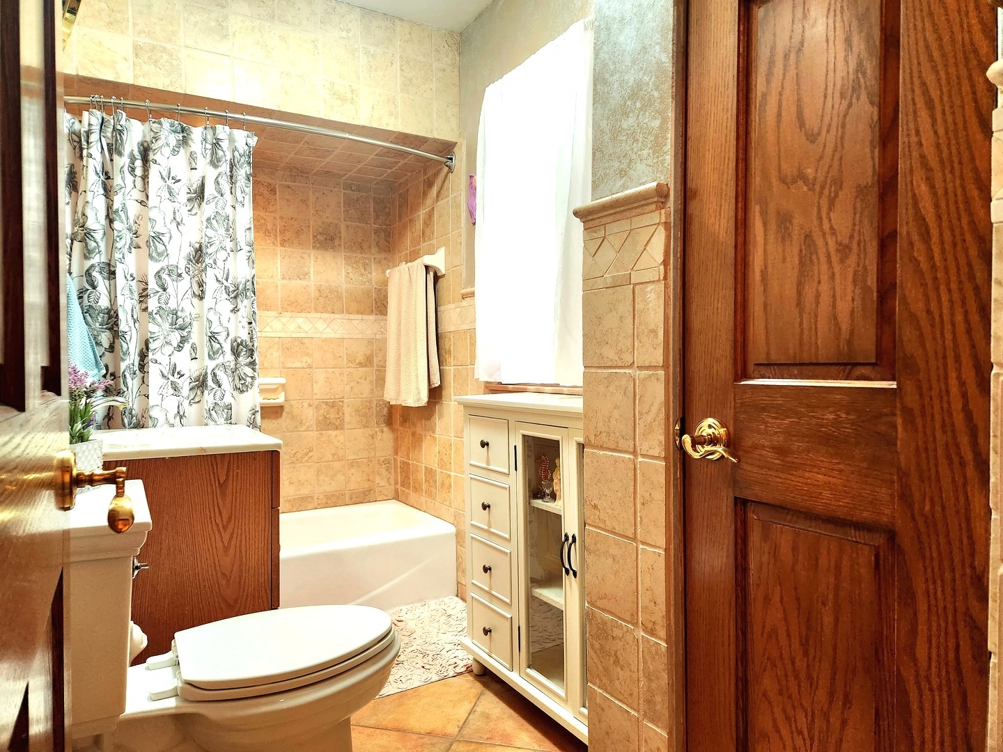 1095 South Prospect Avenue Elmhurst, IL 60126 - Photo 30 of 54 a bathroom with a toilet a sink and shower