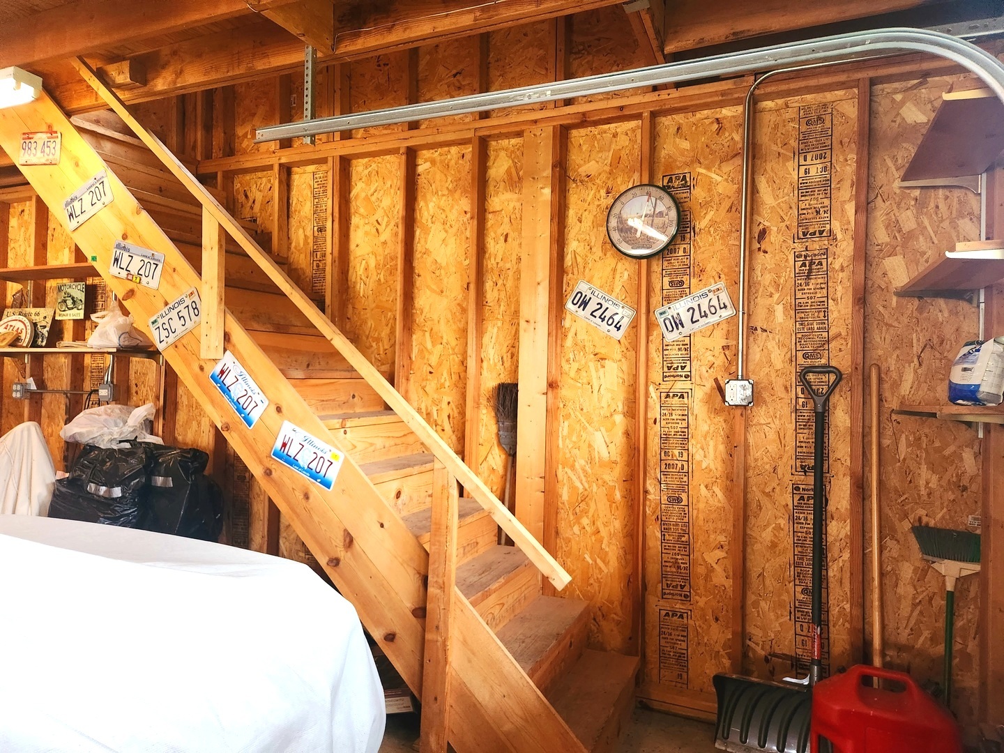 1095 South Prospect Avenue Elmhurst, IL 60126 - Photo 44 of 54 a view of staircase with railing and a chandelier