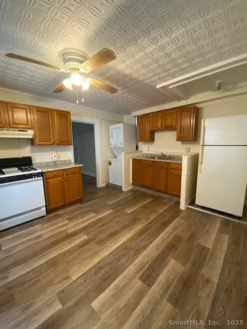 a view of a kitchen with a sink