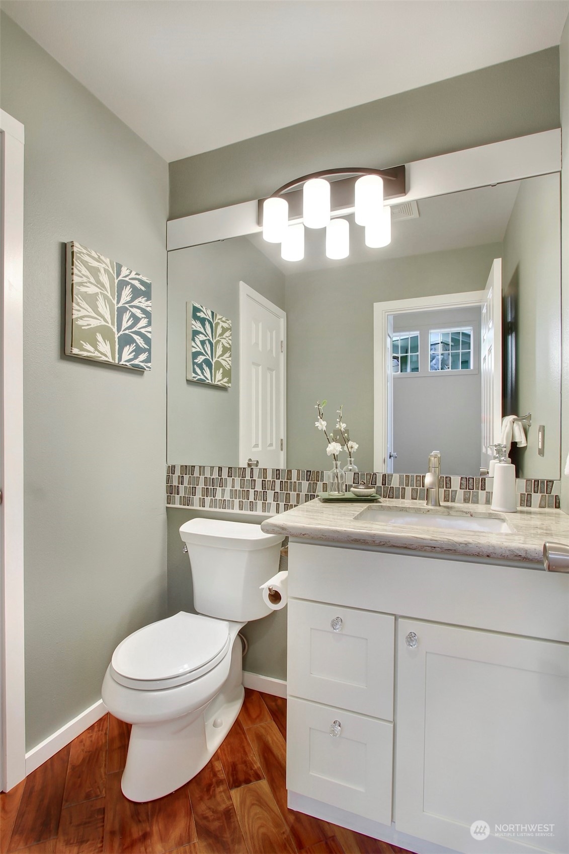 530 Elma Place Northeast Renton, WA 98059 - Photo 16 of 32 a bathroom with a toilet sink and mirror
