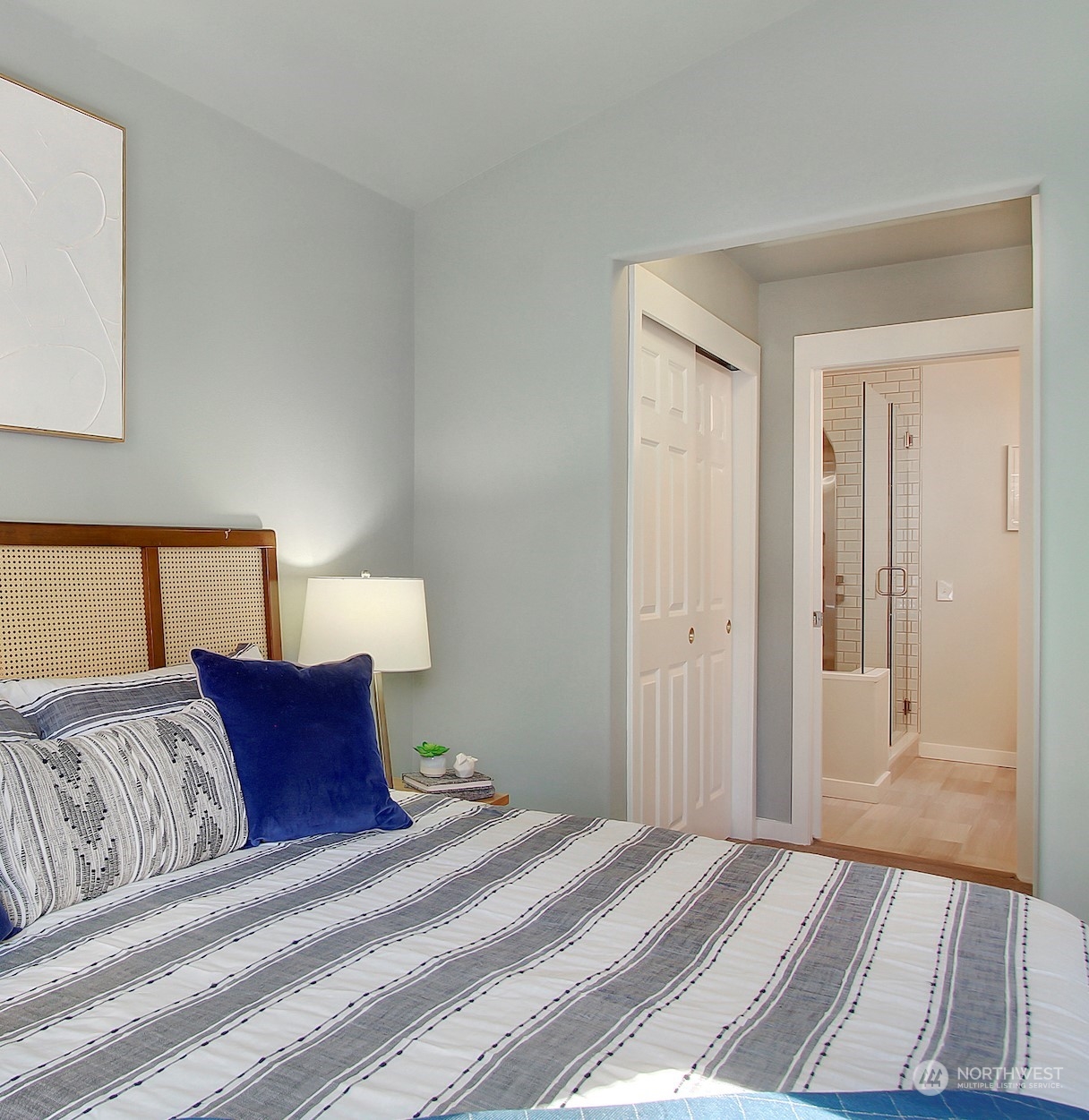 530 Elma Place Northeast Renton, WA 98059 - Photo 19 of 32 a bedroom with a bed and a night stand