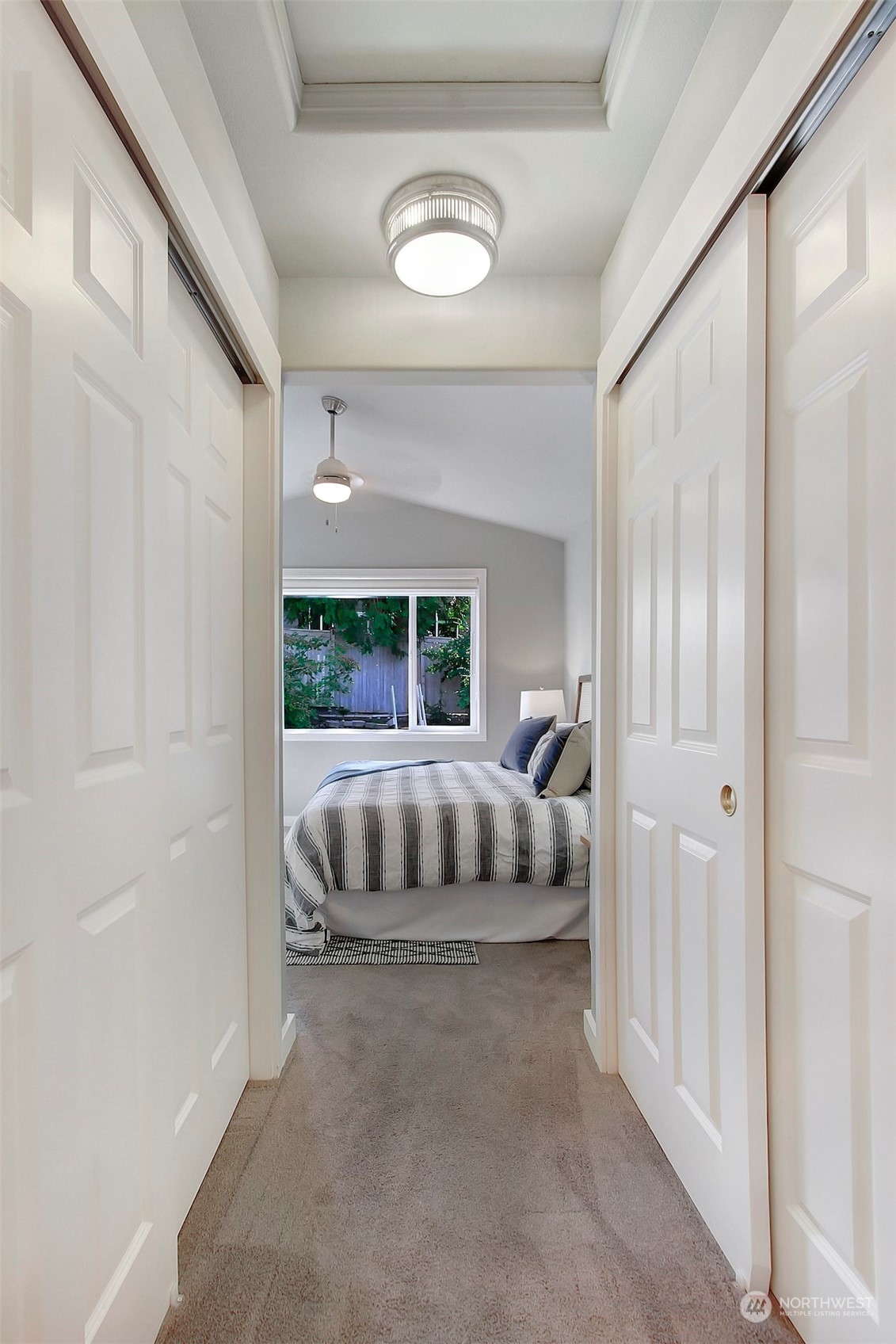 530 Elma Place Northeast Renton, WA 98059 - Photo 22 of 32 a bedroom with a bed and a window