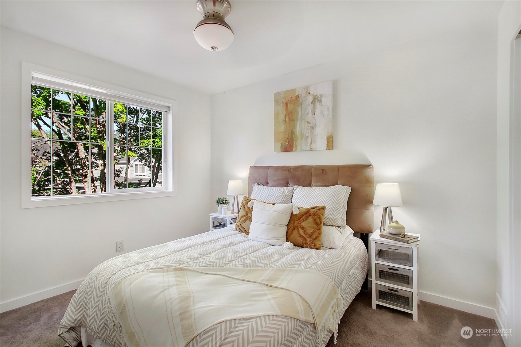 530 Elma Place Northeast Renton, WA 98059 - Photo 23 of 32 a bedroom with a bed and a window