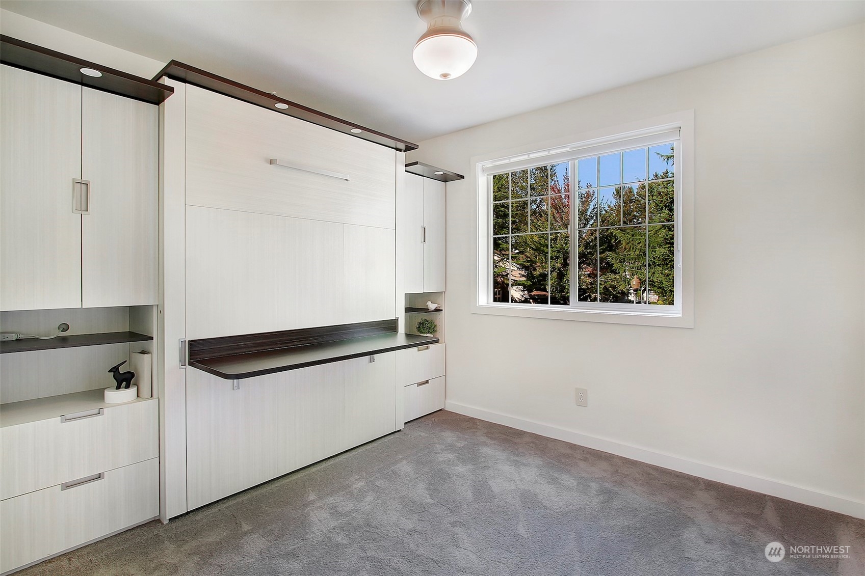 530 Elma Place Northeast Renton, WA 98059 - Photo 24 of 32 a view of storage and utility room with washer and dryer