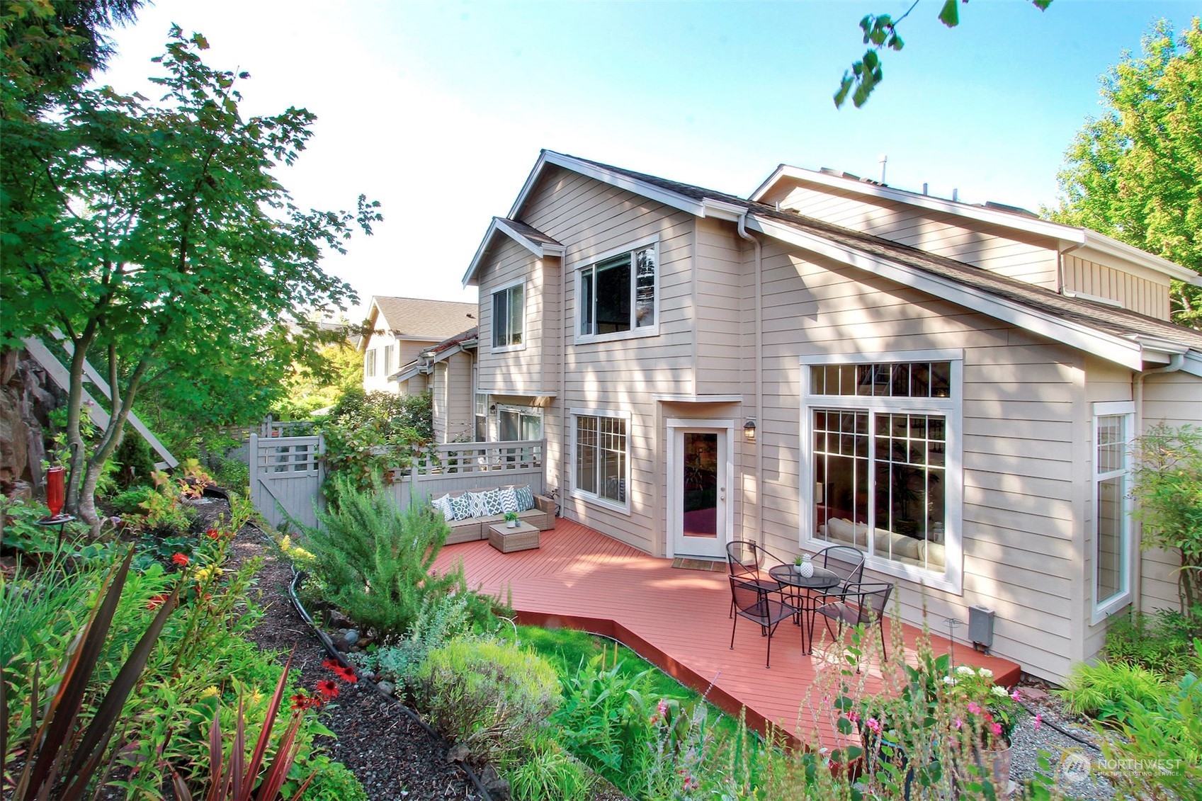 530 Elma Place Northeast Renton, WA 98059 - Photo 27 of 32 a view of a house with backyard and sitting area