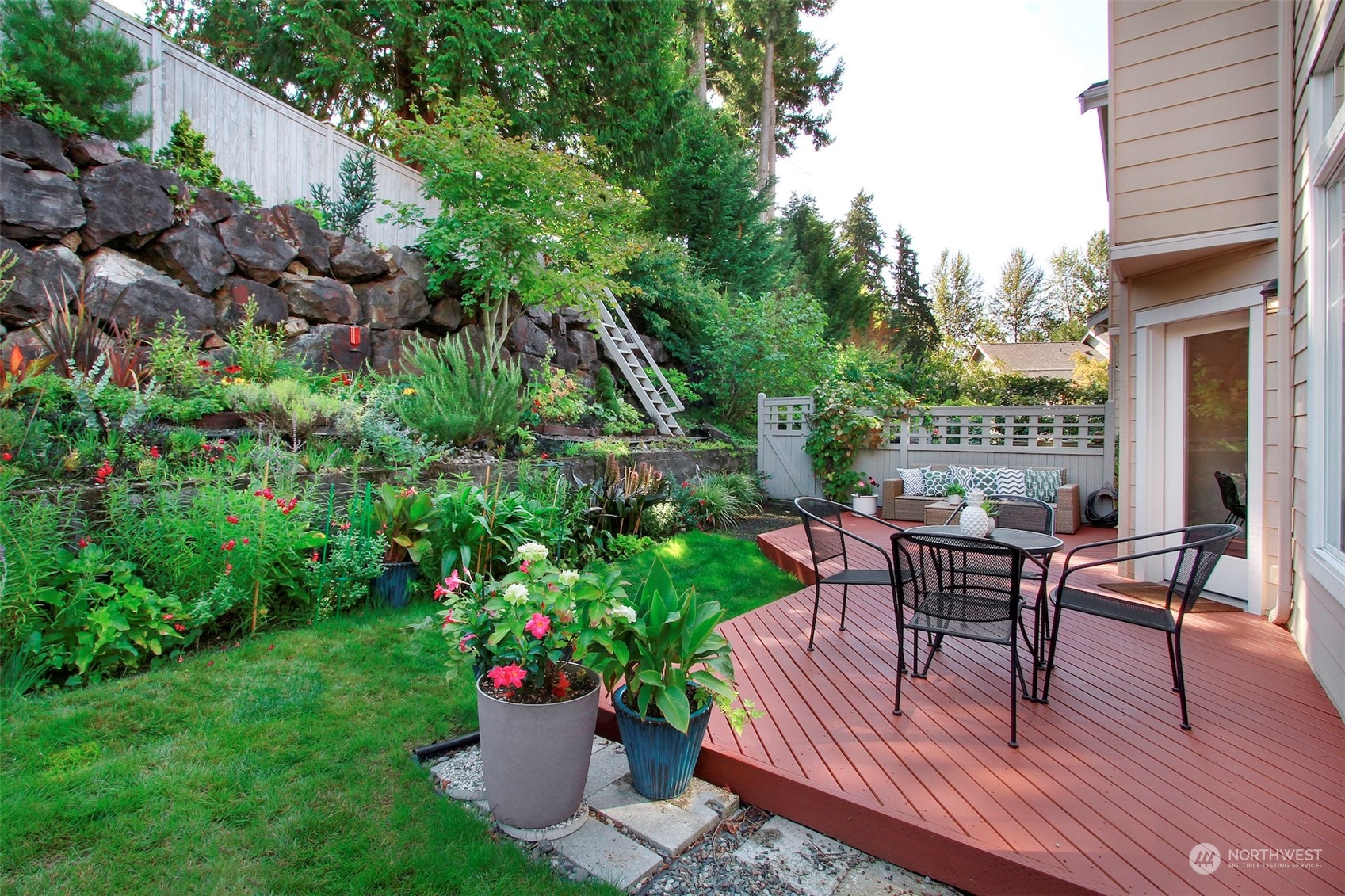 530 Elma Place Northeast Renton, WA 98059 - Photo 28 of 32 a view of a house with backyard and sitting area