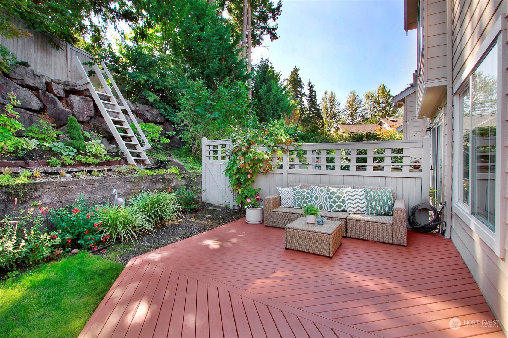 530 Elma Place Northeast Renton, WA 98059 - Photo 29 of 32 a view of a patio with couches table and chairs and potted plants