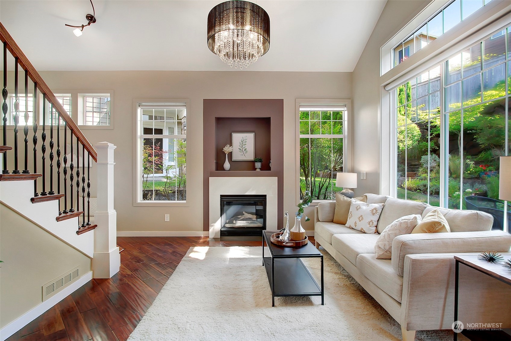 530 Elma Place Northeast Renton, WA 98059 - Photo 7 of 32 a living room with furniture and a fireplace
